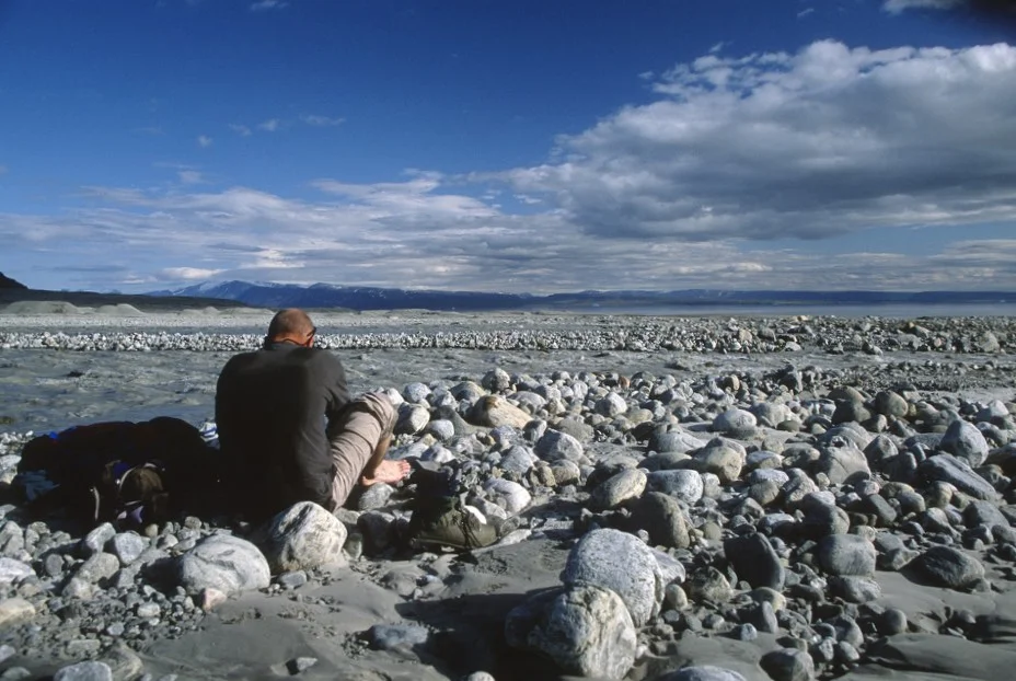 A large river flowing into the Arctic Ocean from the massive Sermilik glacier