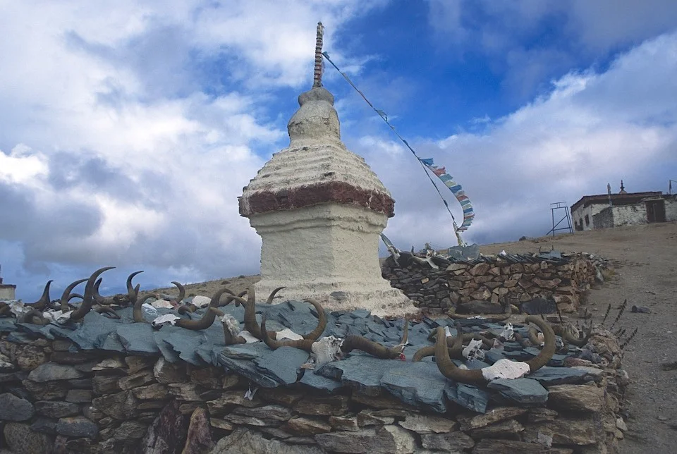 The stupas overlooking Lake Manasarovar. The stones have inscriptions of Buddhist prayers (they are called Mani Stones). The yak horns are also carved with prayer inscriptions (Om Mani Padme Hum).