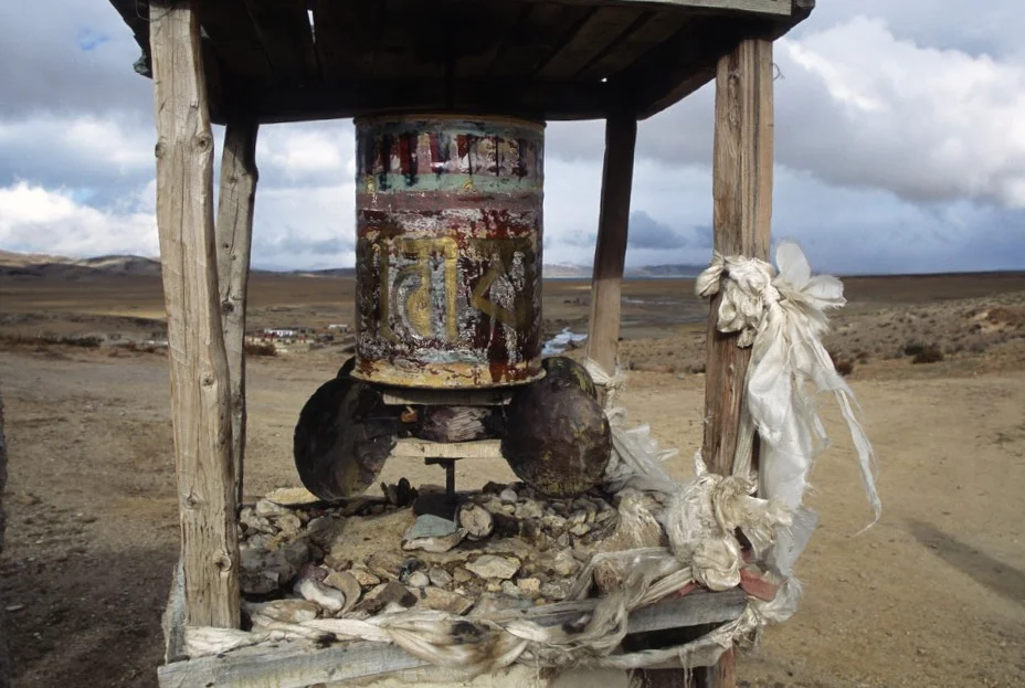 An old prayer wheel powered by wind blades. The silence is broken by the sound of the wind and the squeaks of the wind-powered prayer wheel. For one of the holiest places on Earth it had a very remote and secluded feel.