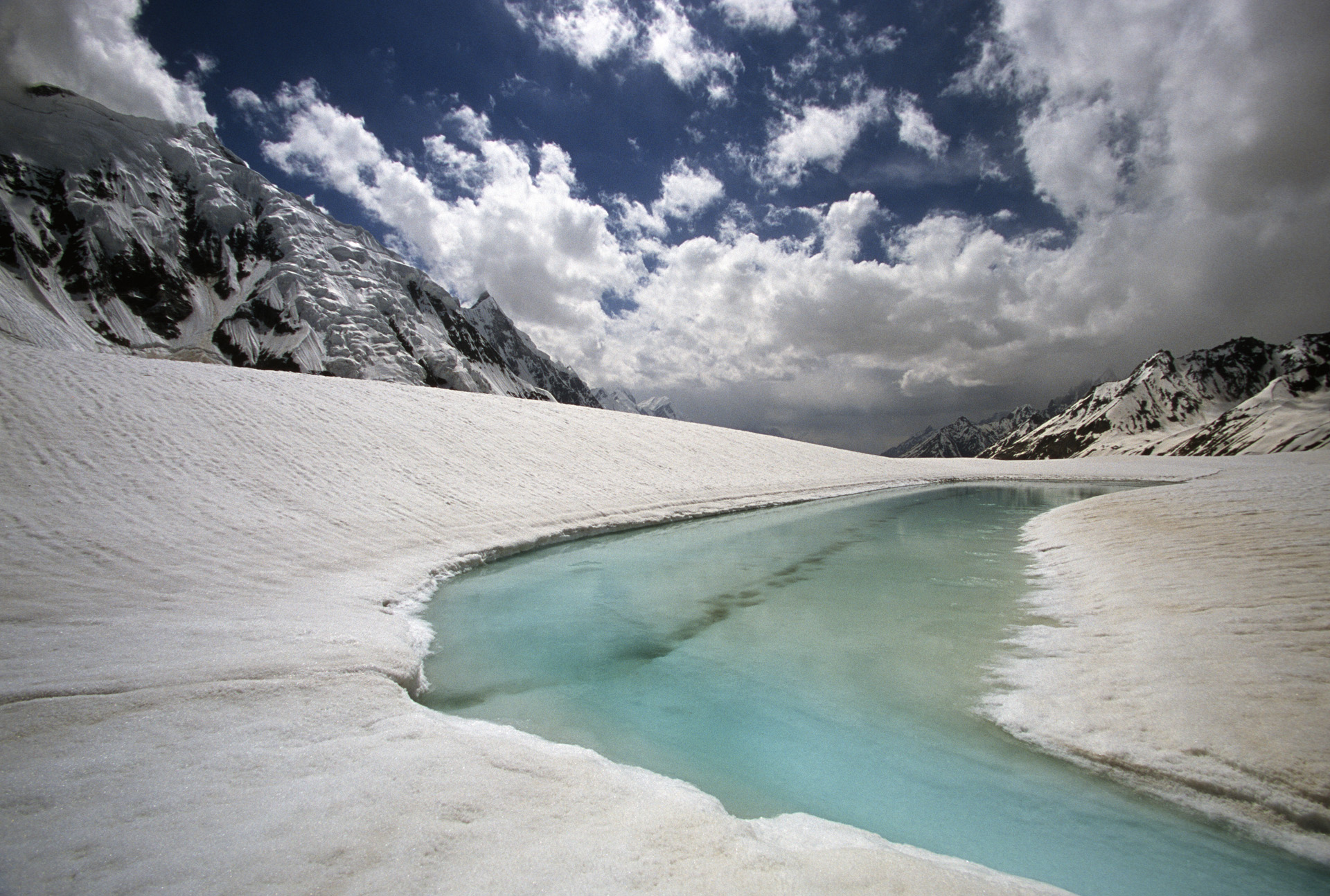 The surface snow melt on the Hispar Glacier which is 49km long. Our campsite near the Khani Basa Glacier at 4,530m.