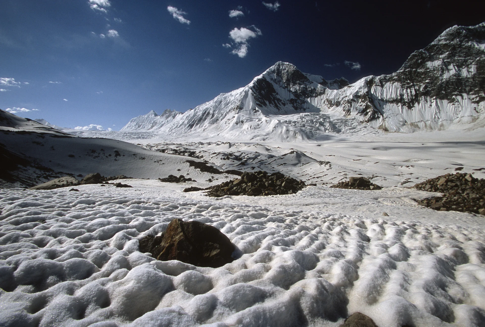 Day 8, we hiked for 5 hours from the Khani Basa camp to Shikambarish Camp at 4,170m. We traversed the Jutmo Glacier and finished it in a downpour. On the way, we had to traverse a hill/moraine of liquid mud that made our progress slow and tedious.
