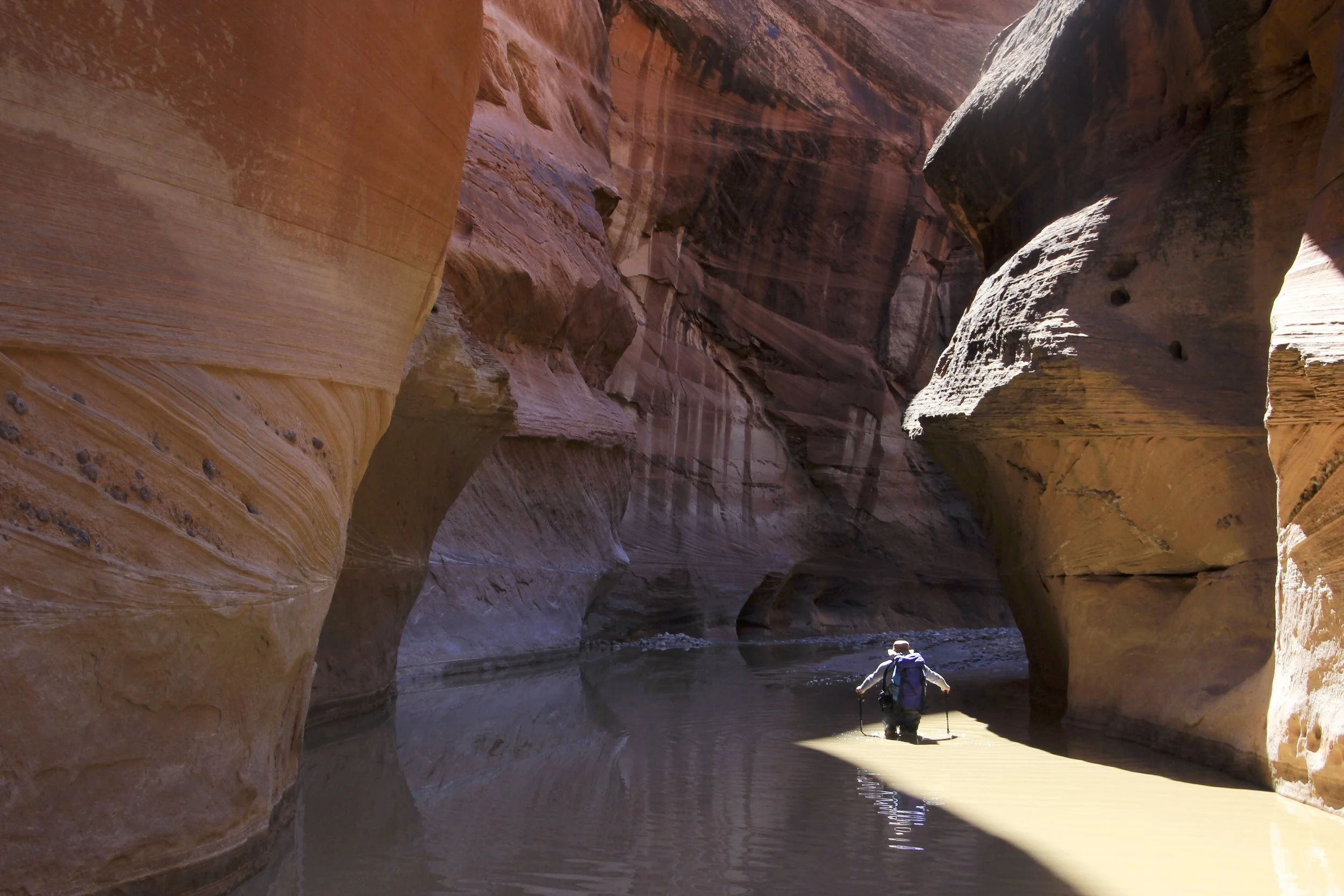 In the Paria River, crossing one of the deeper sections
