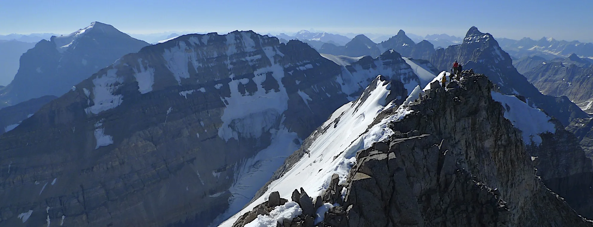 Mt. Temple on the left, Mt. Leroy in the centre and the summit ridge of Mt. Victoria