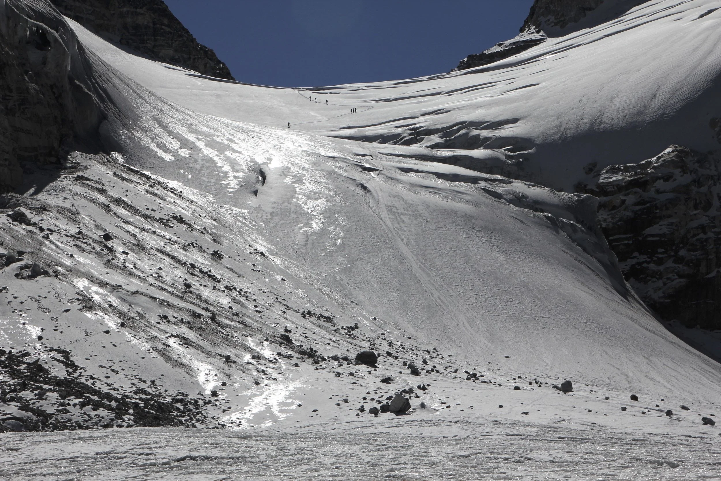 The steeper section had a fixed rope for the porters as they had no crampons. The fixed rope made for an easy and quick descent for everyone.