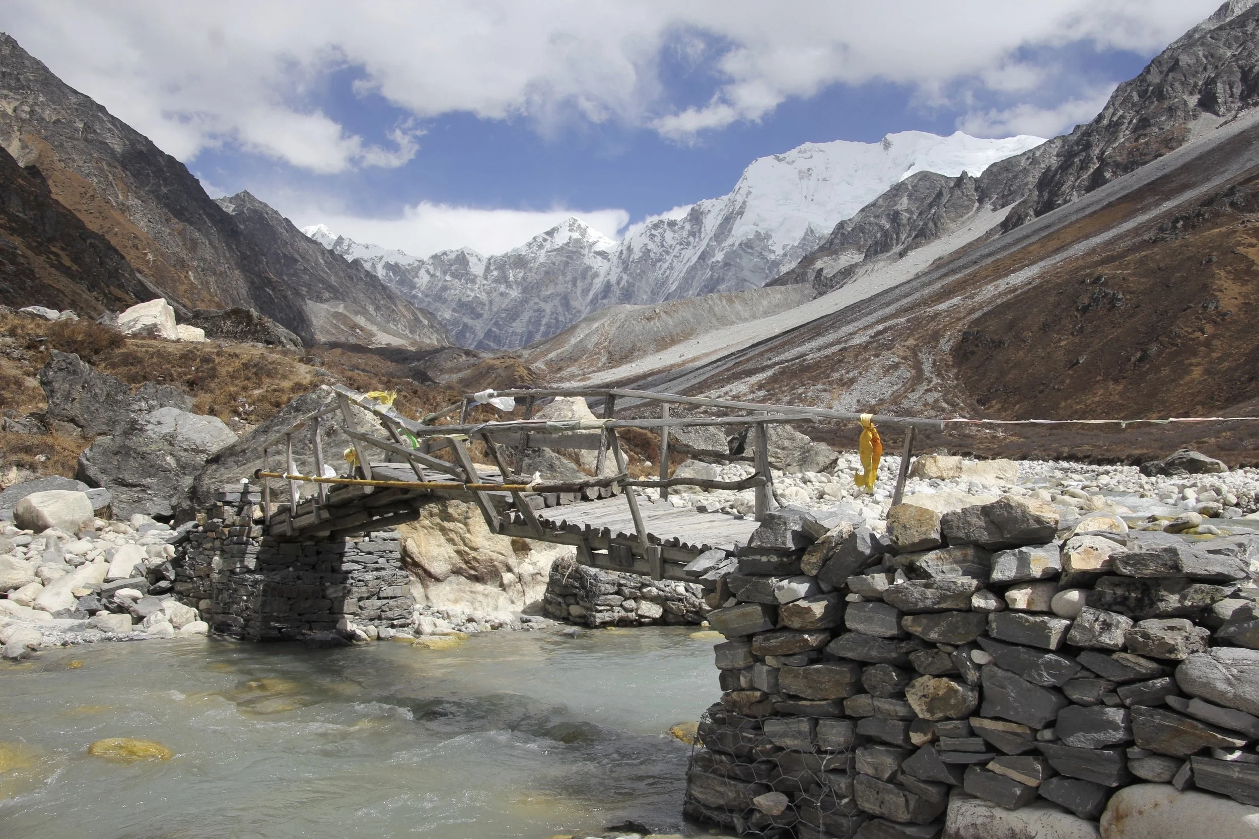 We were ready to ford the Langtang River but to our surprise there was this beautiful bridge. The snout of the Langtang Glacier is in the distance.