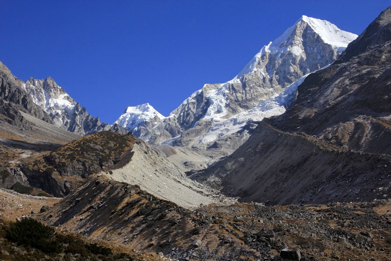 The glacier leading to Tilman Pass East. We went all the way to the end of the moraine before we realized our mistake! The flat top mountain is Gur Karpo Ri 6,892m. The large mountain on the right is Dorje Lakpa 6,966m.