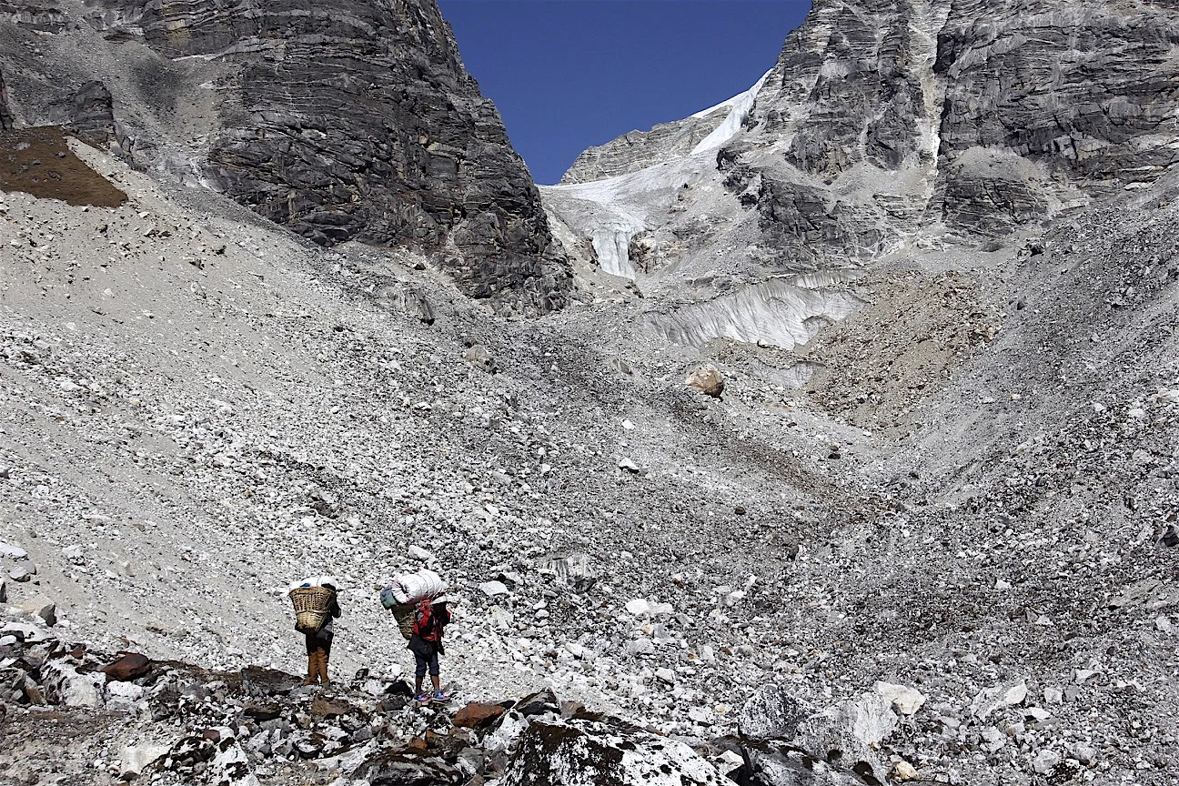Approaching the Tilman Pass high camp. The camp is located between the pass and the the white lip of the glacier.
