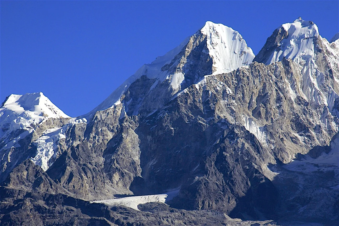 The Langtang and Jugal Himals from the south. The ridge we followed offered spectacular views in the morning and evening. During the day, massive clouds obscured all views. On the left is Gurkarpo Ri 6,889m, to its right is Dorje Lakpa 6,966m and then the unnamed sister peak 6,563m.