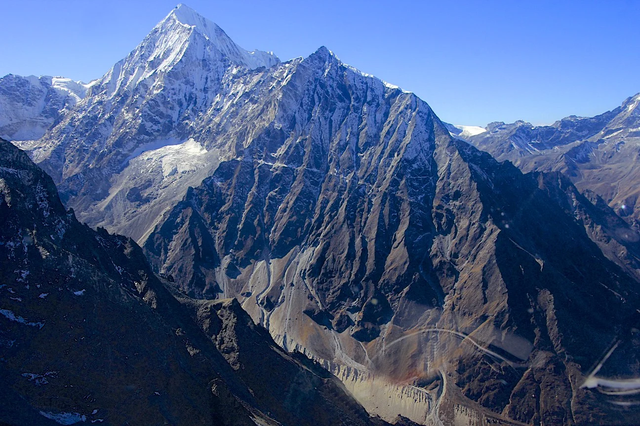 Langshisa Glacier and Ganchempo Peak.