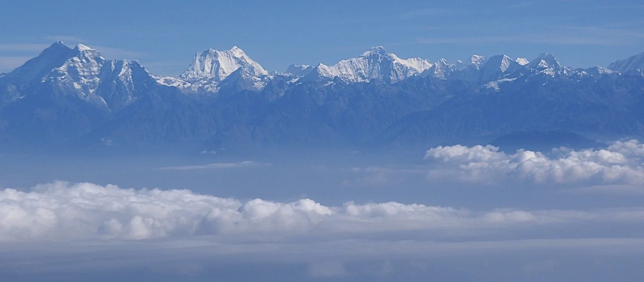 Rowaling Valley from the air. From Left to Right: Gaurisankar, Menlungtse, Kang Nachugo, the peaks of Rowaling. Our route followed this range from left to right.