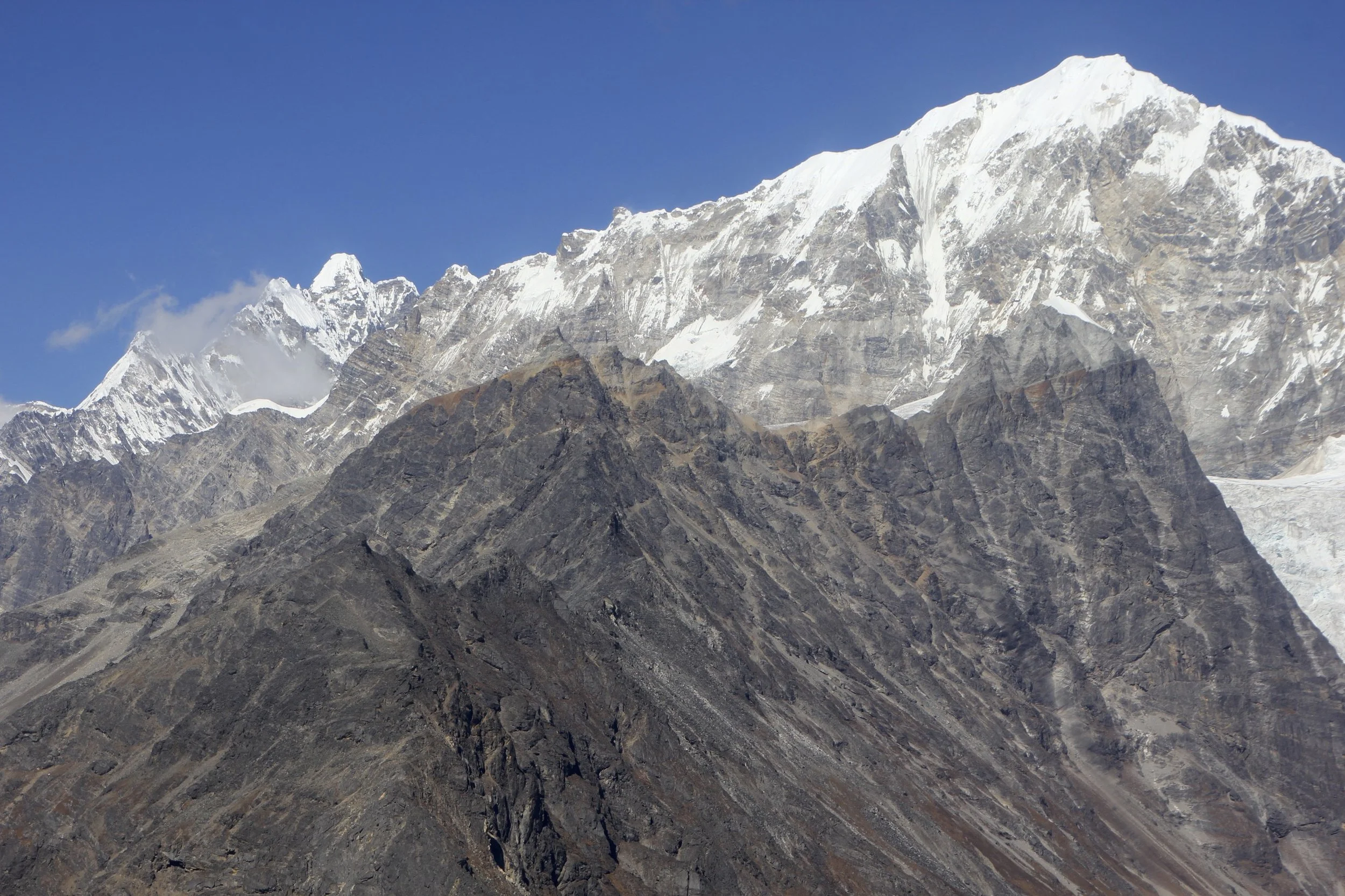 Yala Peak is the highest point along the rocky ridge