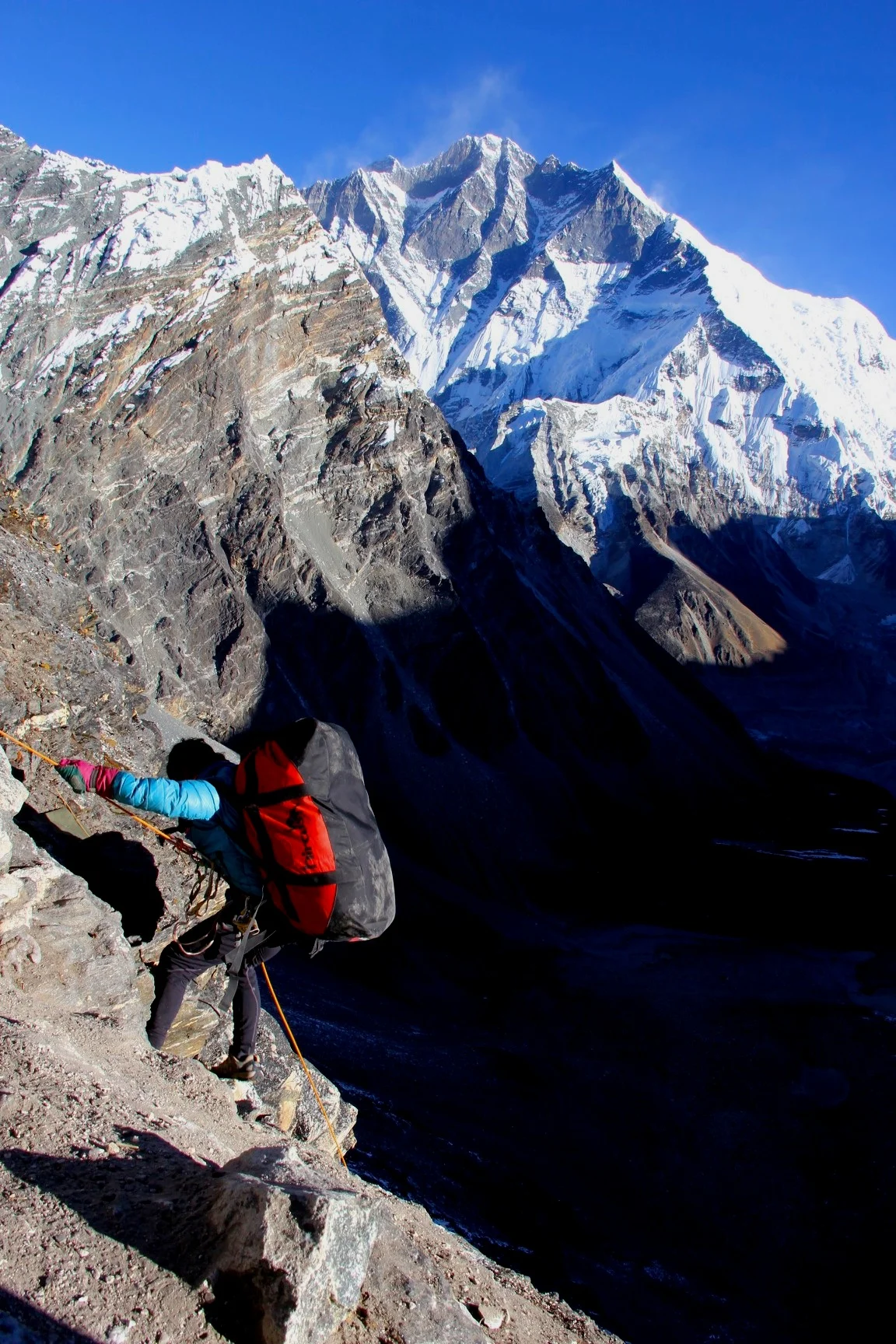 Very steep descent from Amphu Labtsa Pass with Lhotse South wall dominating the skyline.