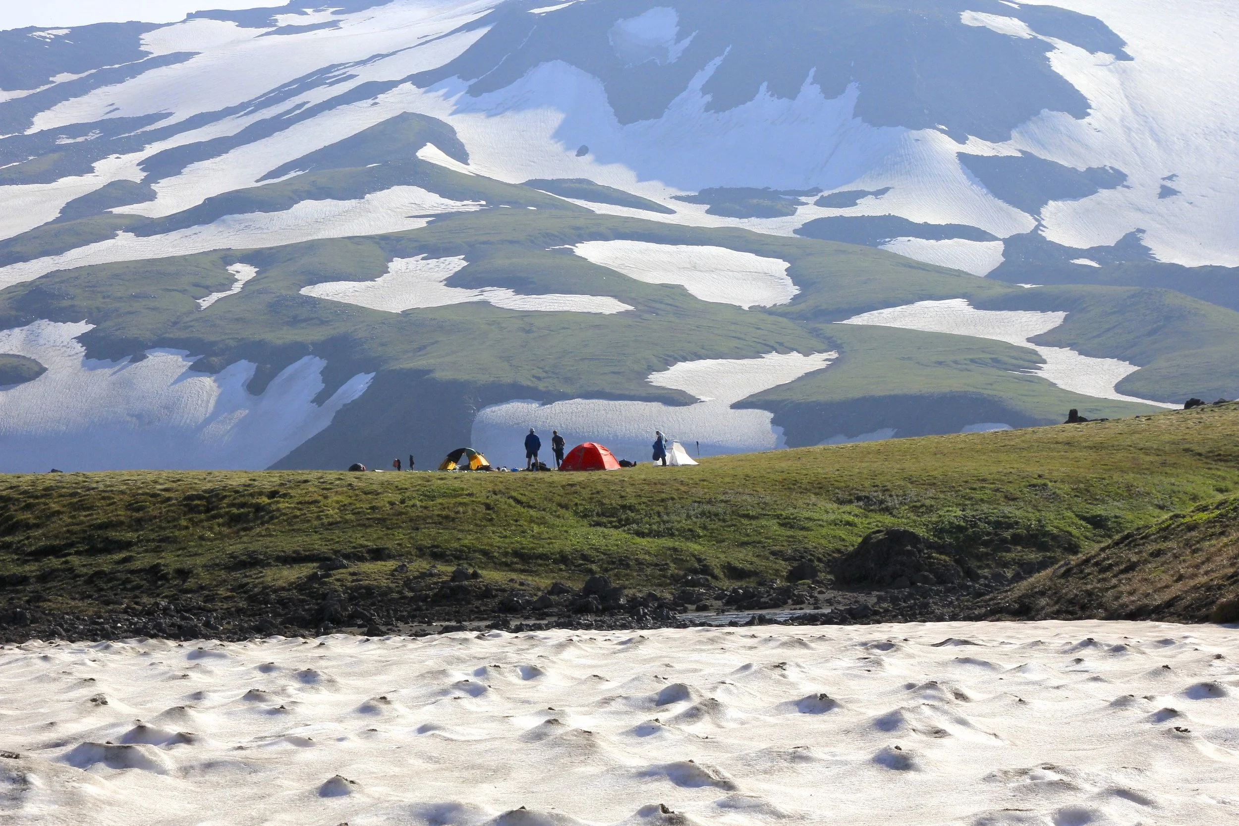 Fellow trekkers camping at the base of the Zimina Volcano.
