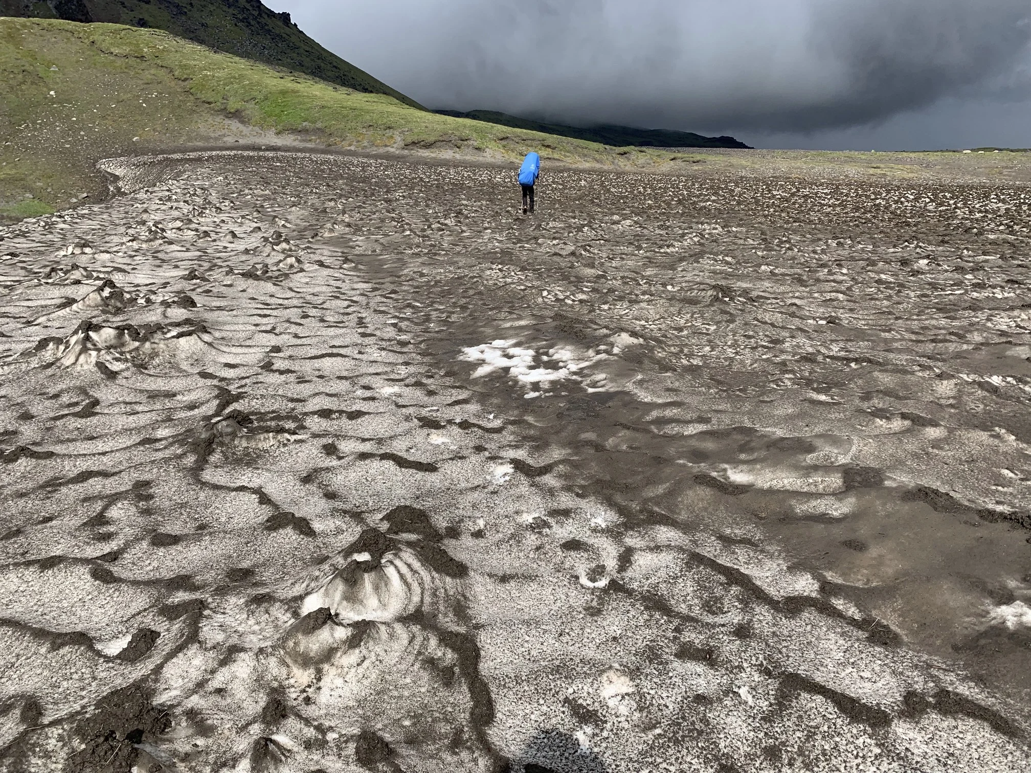In some areas snow lingers all year round. The summers are very short here and it can snow at any time of the year. Walking on these snow fields was tricky as sometimes there was a hidden channel of melt water. It was easy to punch right through and fall into a wet crevice.