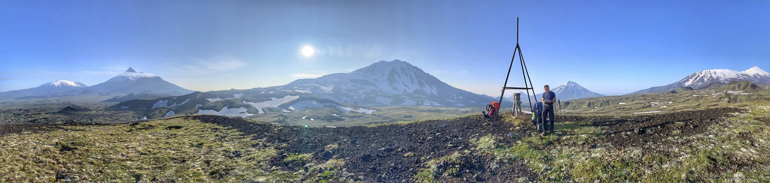 The Tolbachik Pass is an excellent view point from which all the major volcanoes of the park can be seen. From left to right: Ushkowsky Volcano 3,943, Krestowky Volcano 4,057m, Kamenny 4,580m, smoky Bezimienny 2,800m, Ziminna 3,081m, Udina 2,921m and Plotsky and Ostry Tolbachik 3,085k and 3,672m.