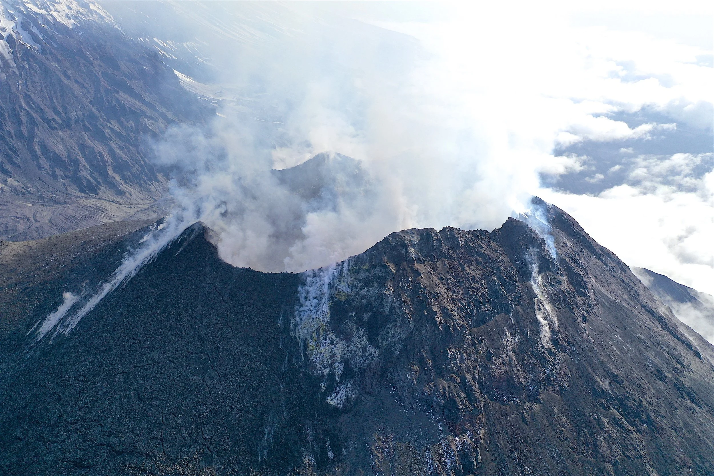 Drone photo by Evgeny Androssov. This is the crater of the lava dome of the Bezimienny Volcano. It would be a tricky ascent given numerous active vents and ash.