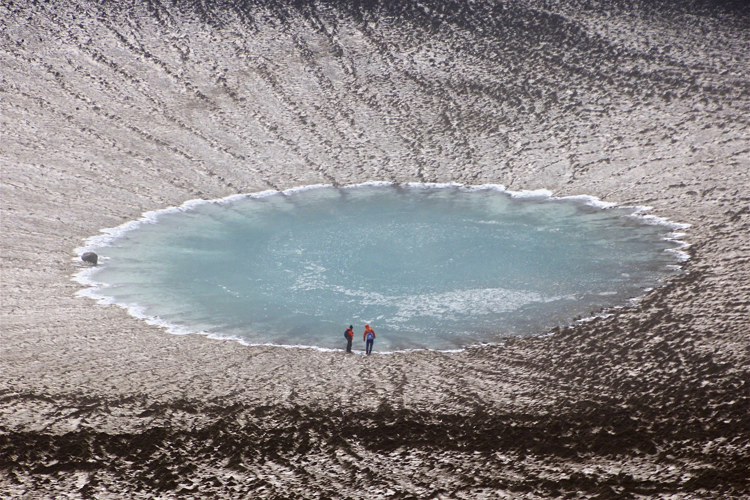 This is also an active crater. The much larger lake disappeared after 2003.