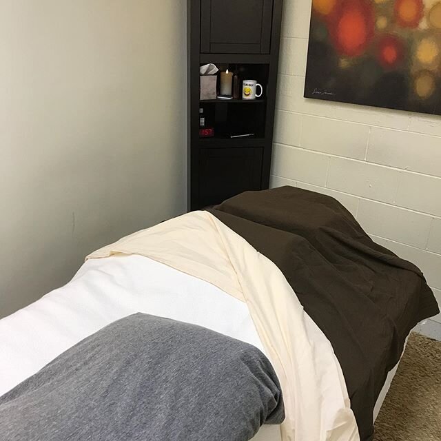 This is my prenatal massage setup! I use two BodyCushion cushions for resting your head and torso on your side. The gray pillow is hypoallergenic and goes between your knees. This positioning is very relaxing and is great for anyone dealing with hip 