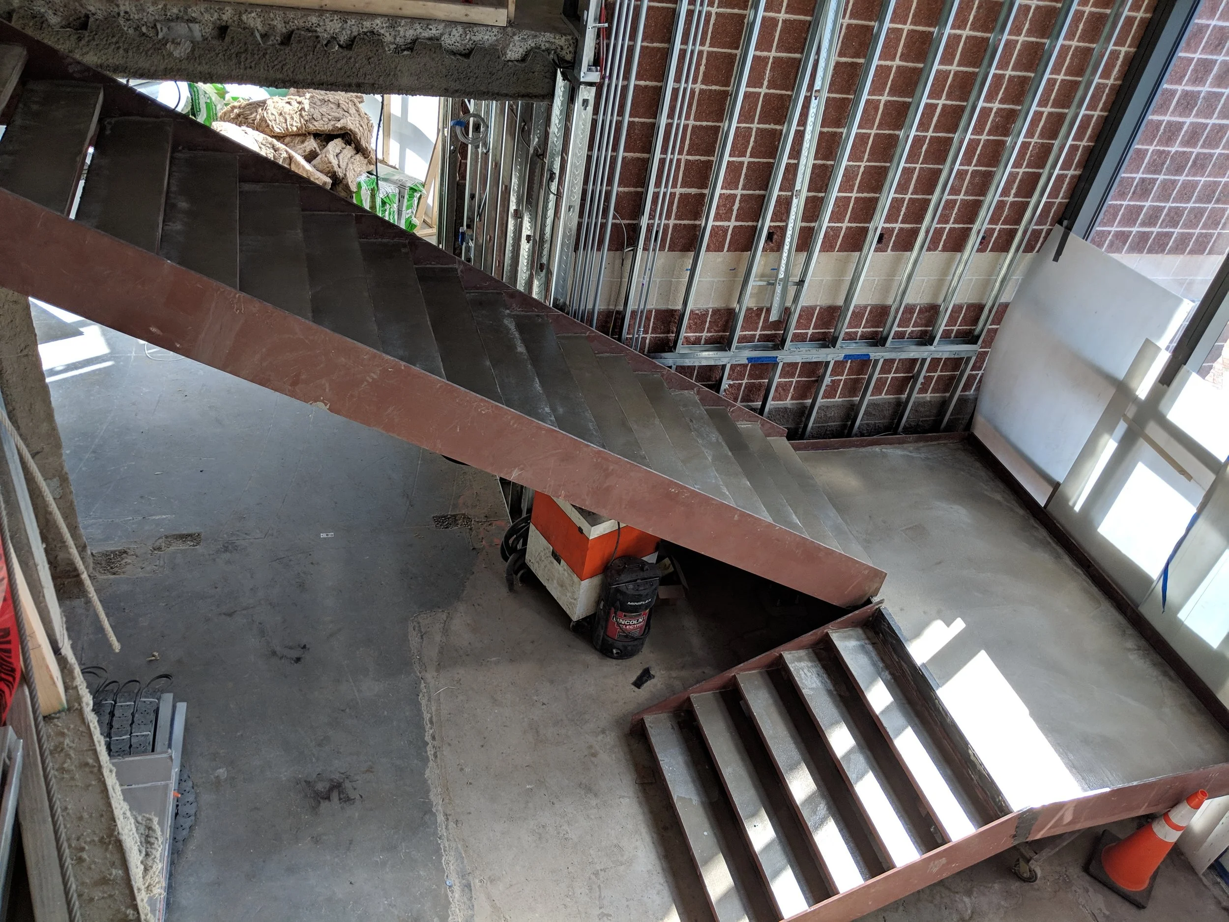 April 2019 - The new lobby staircase has been installed with steel beams and concrete.