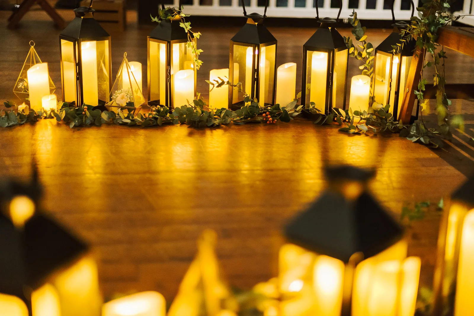 garden wedding backdrop with many lanterns