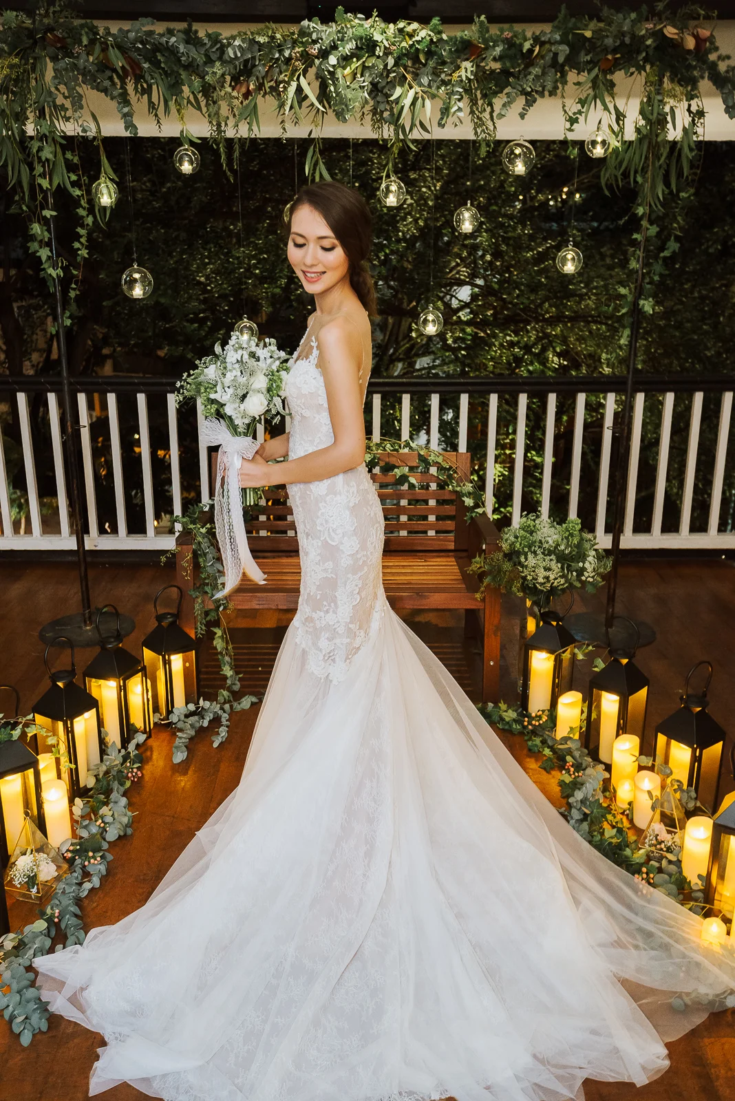 wedding huts bride with hand tied bridal bouquet in a mermaid wedding gown