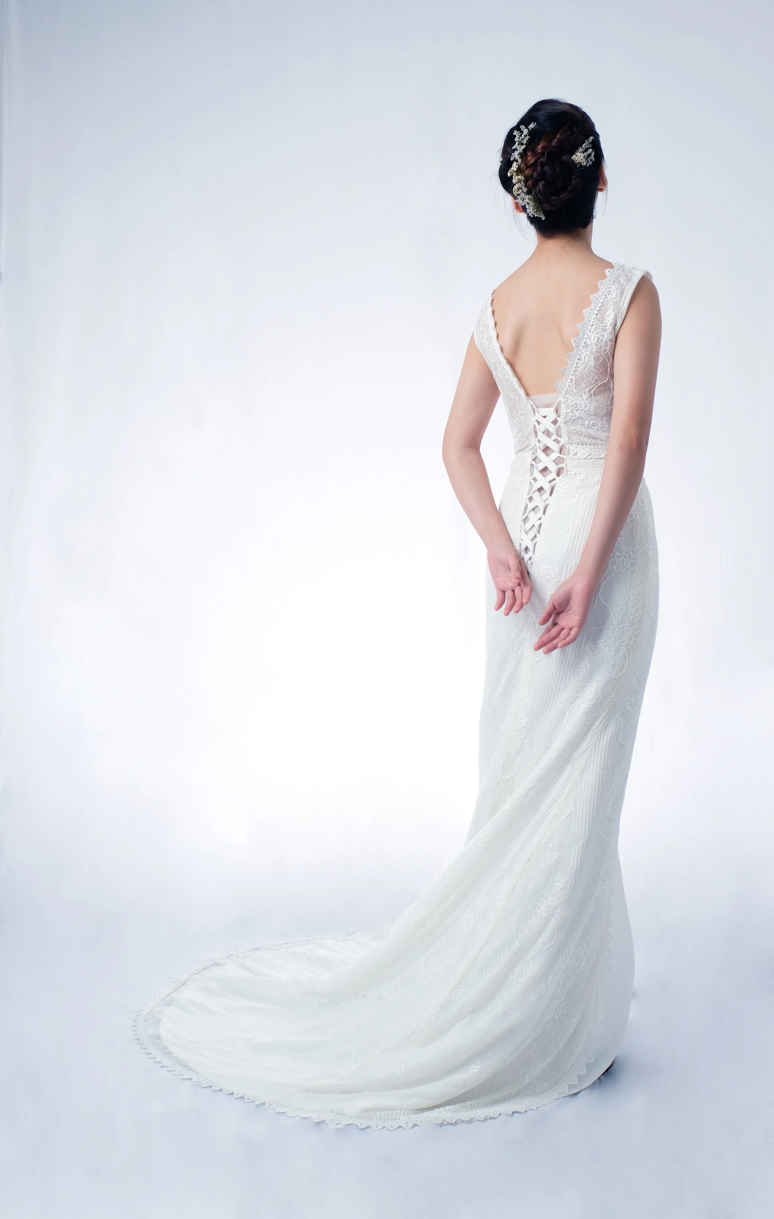 bride in wedding bridal v neck sheath gown with court train