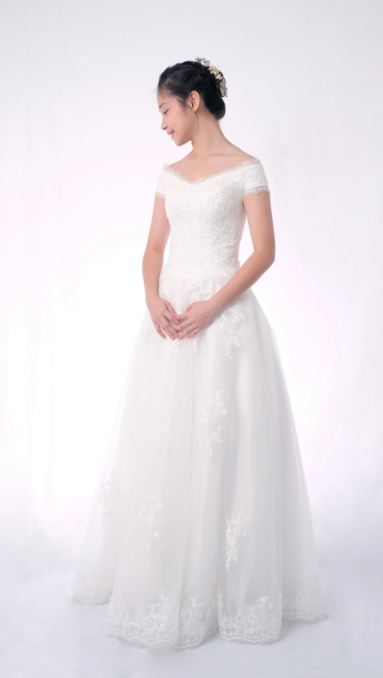 bride in wedding bridal off shoulder v neck sheath gown