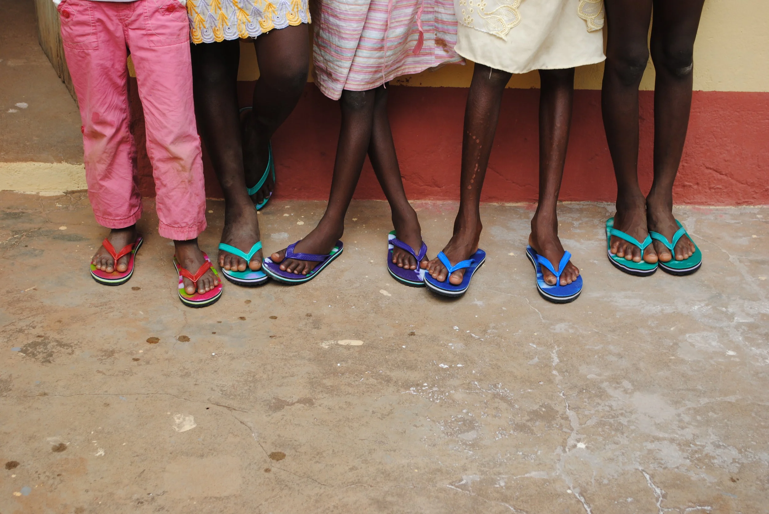 You can probably tell that the few clothes they had were ill-fitting and in bad shape. One of the first things Celestine did was bring over new shoes and have the girls fitted for Sunday dresses by a seamstress.