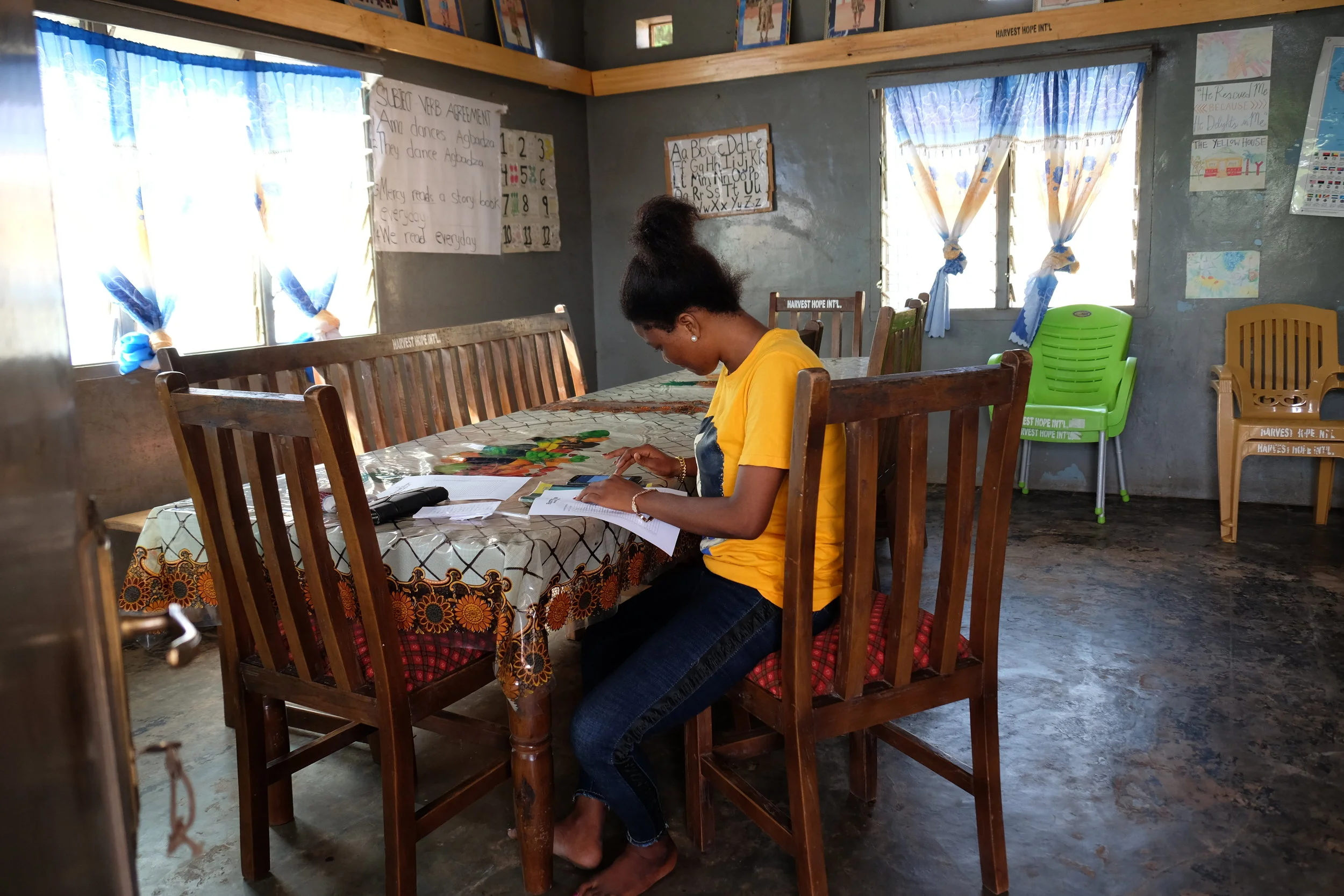 Mercy preparing to go to the market—making her list and calculating the costs. I hope all of our donors know how well our Ghanaian staff stewards our finances. Mercy and Bernard track everything down to the last pesewa.