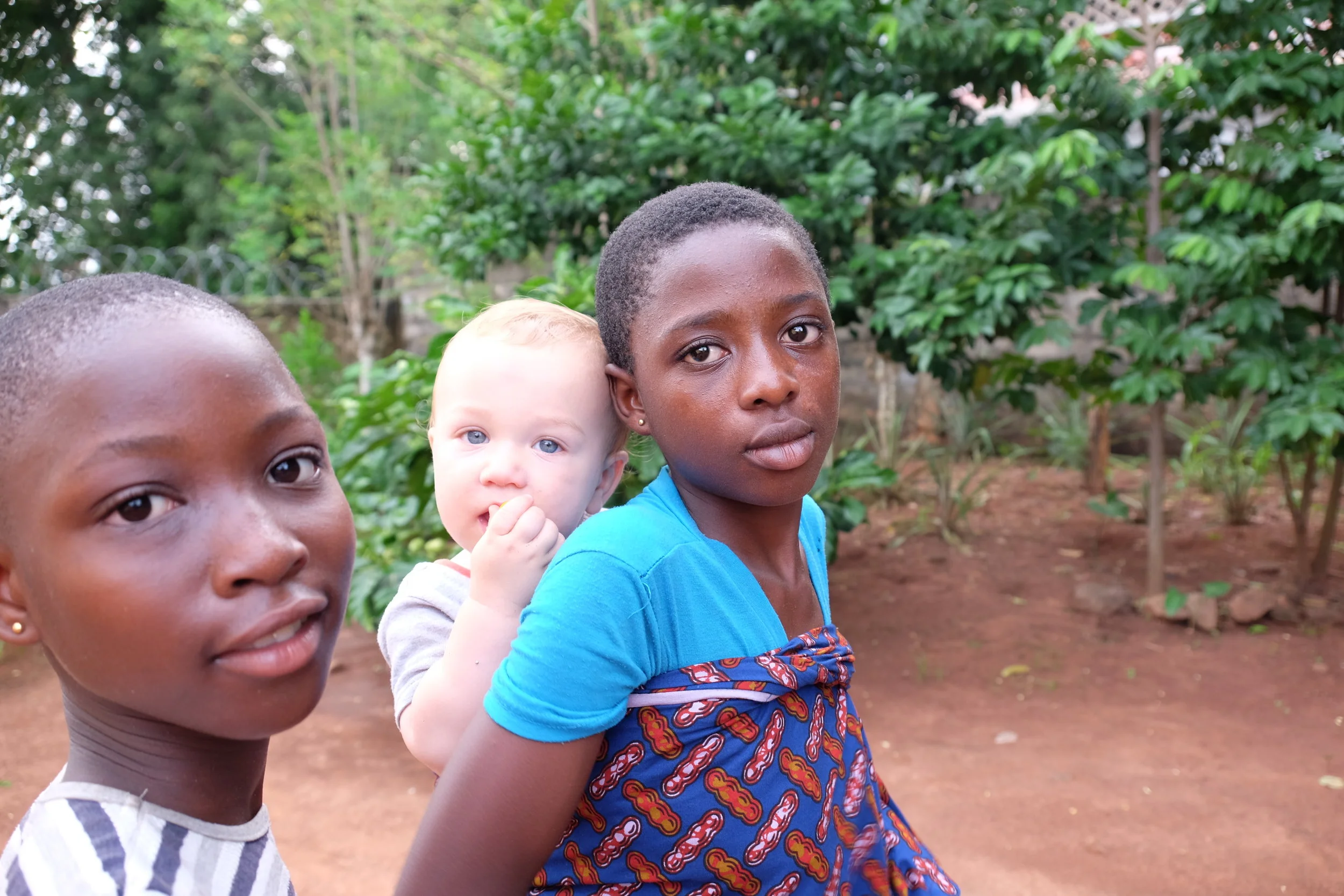 Gloria and Sarah Jr.—wearing Lewis the Ghanaian way.