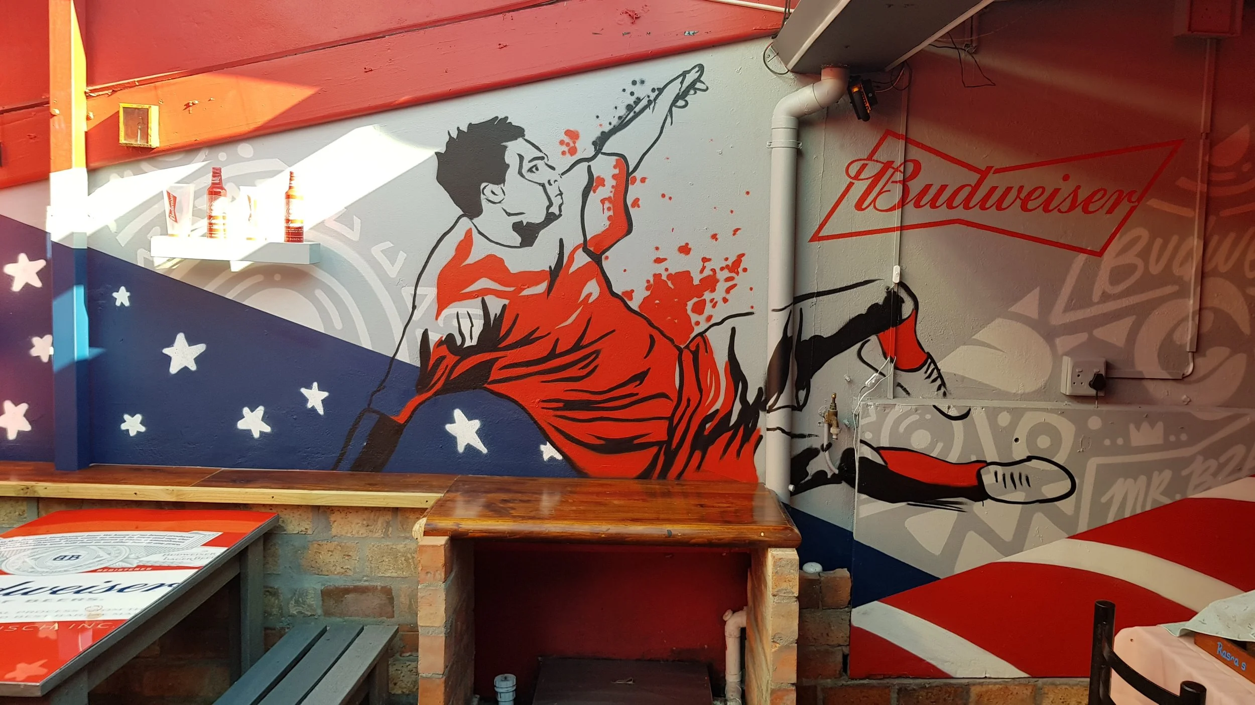 Budweiser FIFA World Cup branded graffiti mural painted by Mr Bzar in a Cape Town pub