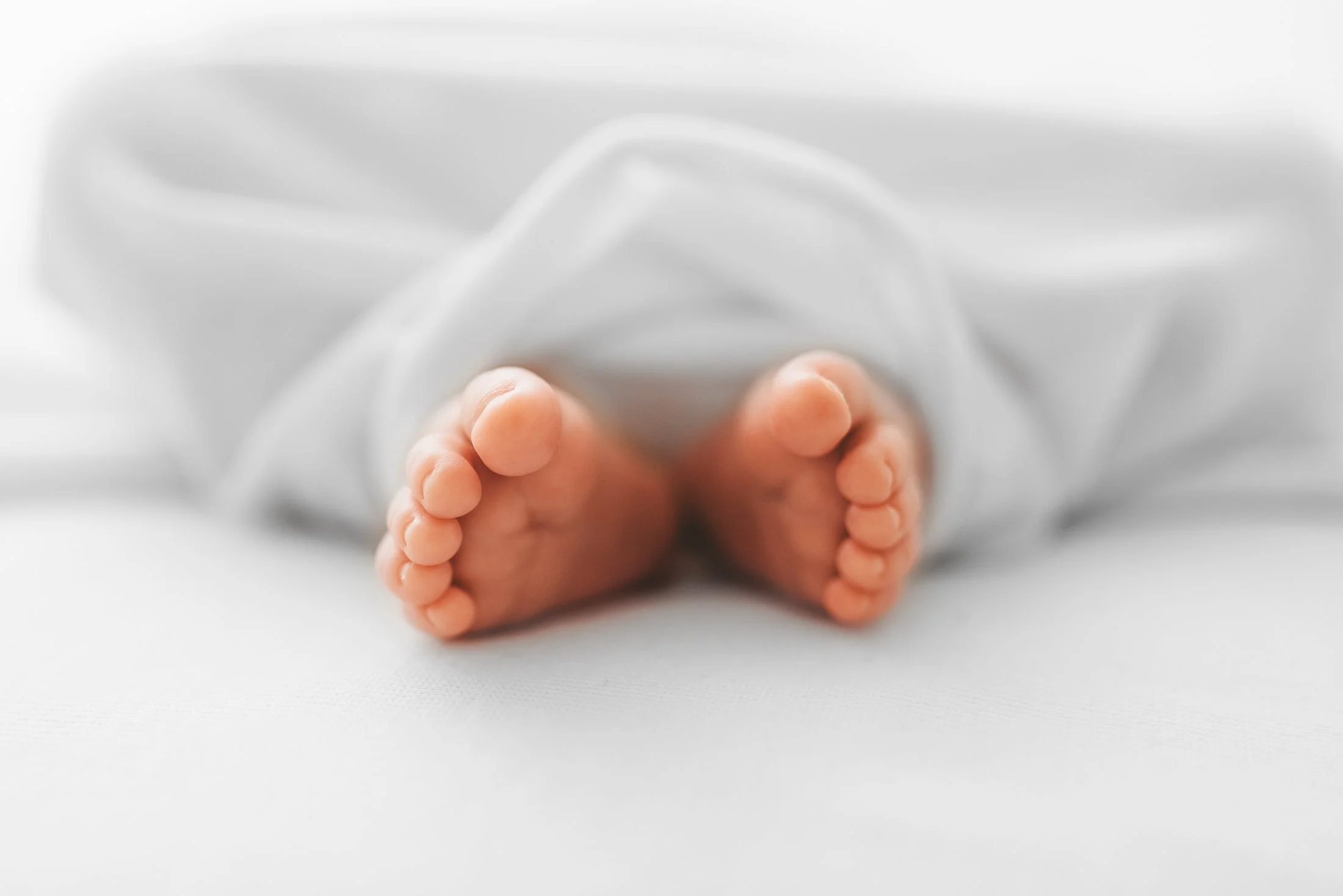 Relaxed newborn photography session in a calm studio in Wokingham