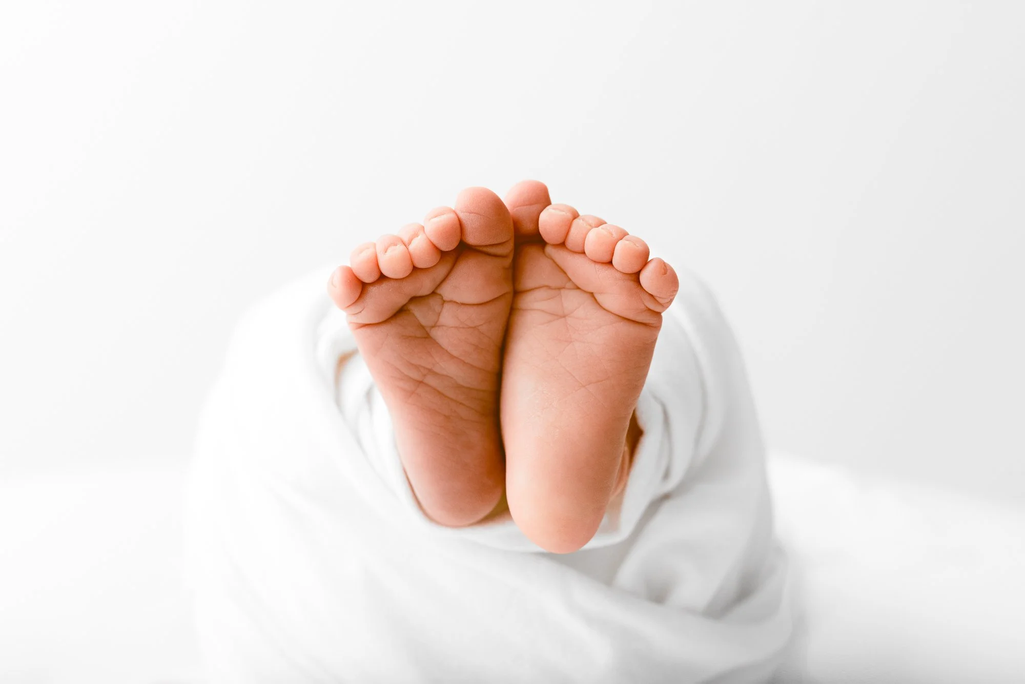 Relaxed newborn photography session in a calm studio in Wokingham