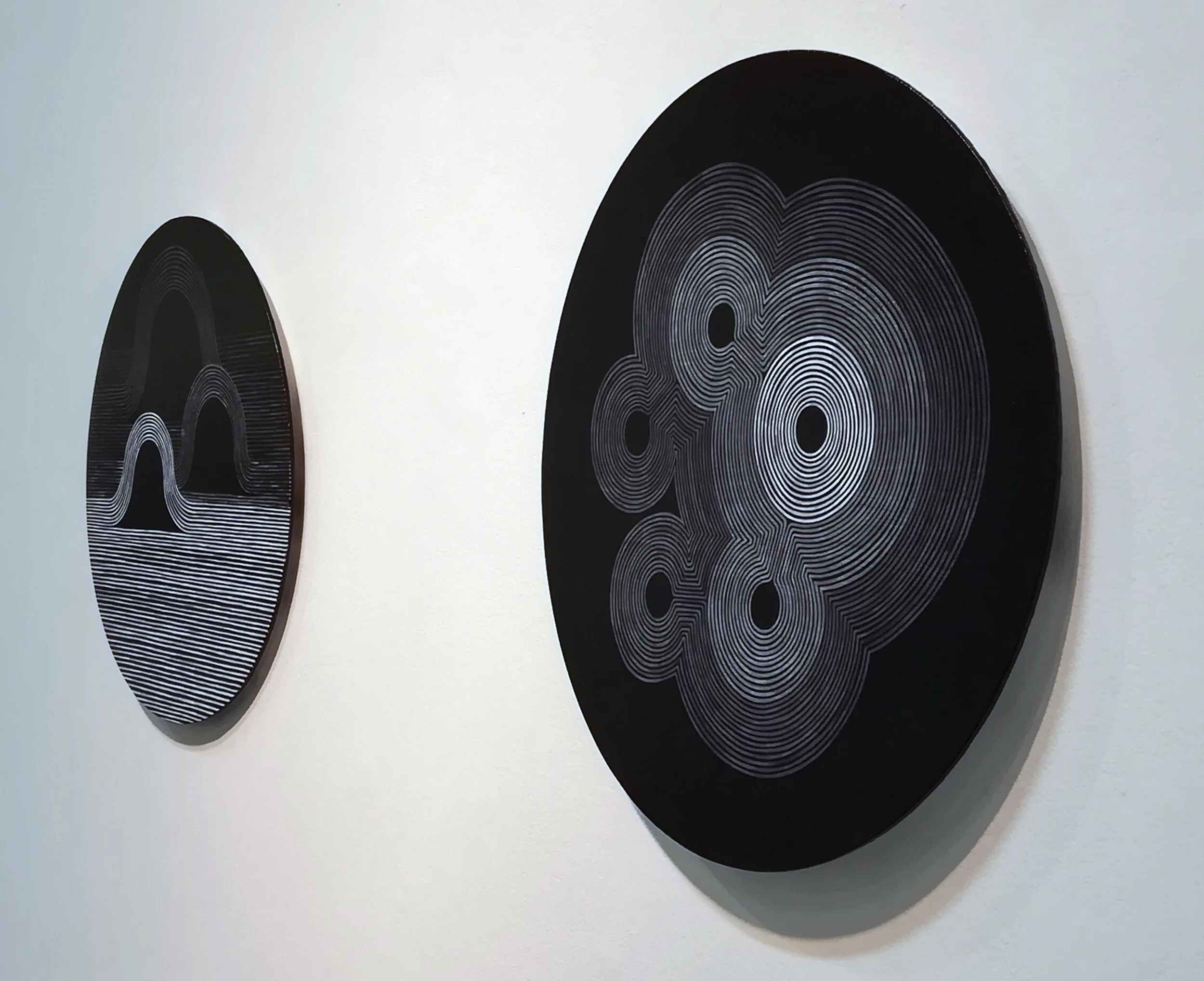 Drift , acrylic on canvas panel (left) and Pulsate , acrylic on canvas panel (right)