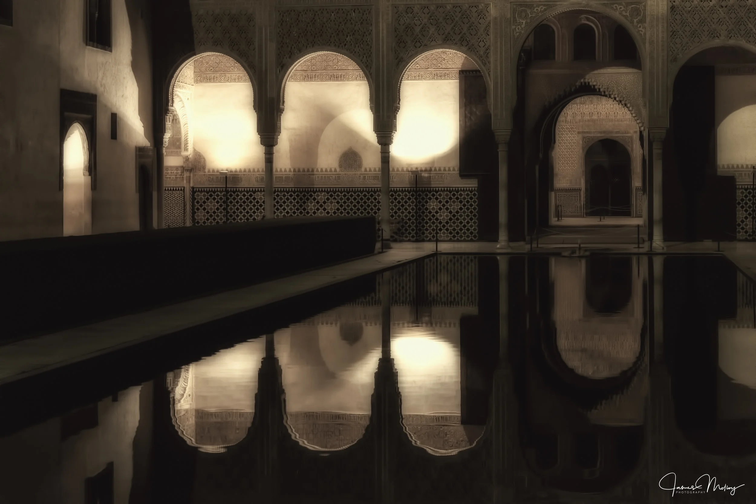 Light and Shadow at the Alhambra - Nikon D750, 1/30 @ f/4.0, ISO 6400, 62mm - Shot on a night visit to the Alhambra in Spain. I had to hand hold this one. I altered the toning in post and diffused the lighting. This image has been a very successful one for me.