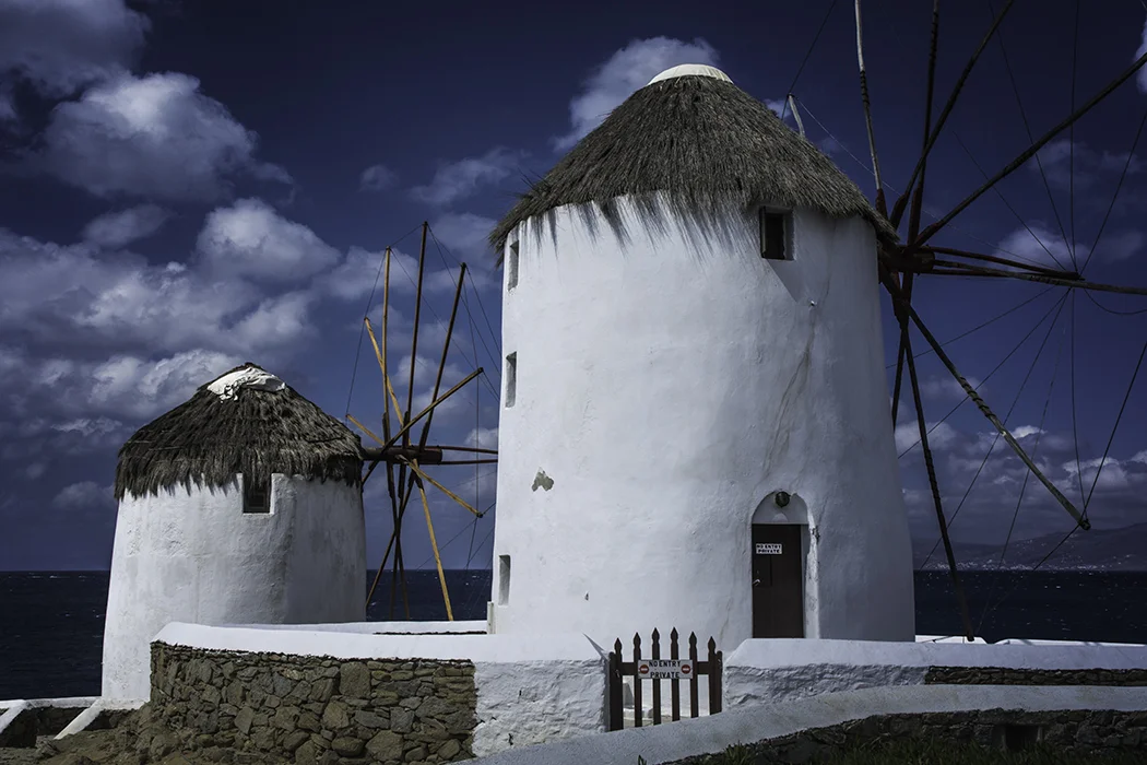 Windmills of Mykonos - Nikon D7100, 1/160 @ f/14, ISO 200, 25mm - The circular polarizer made the shot. One of my most popular photographs!