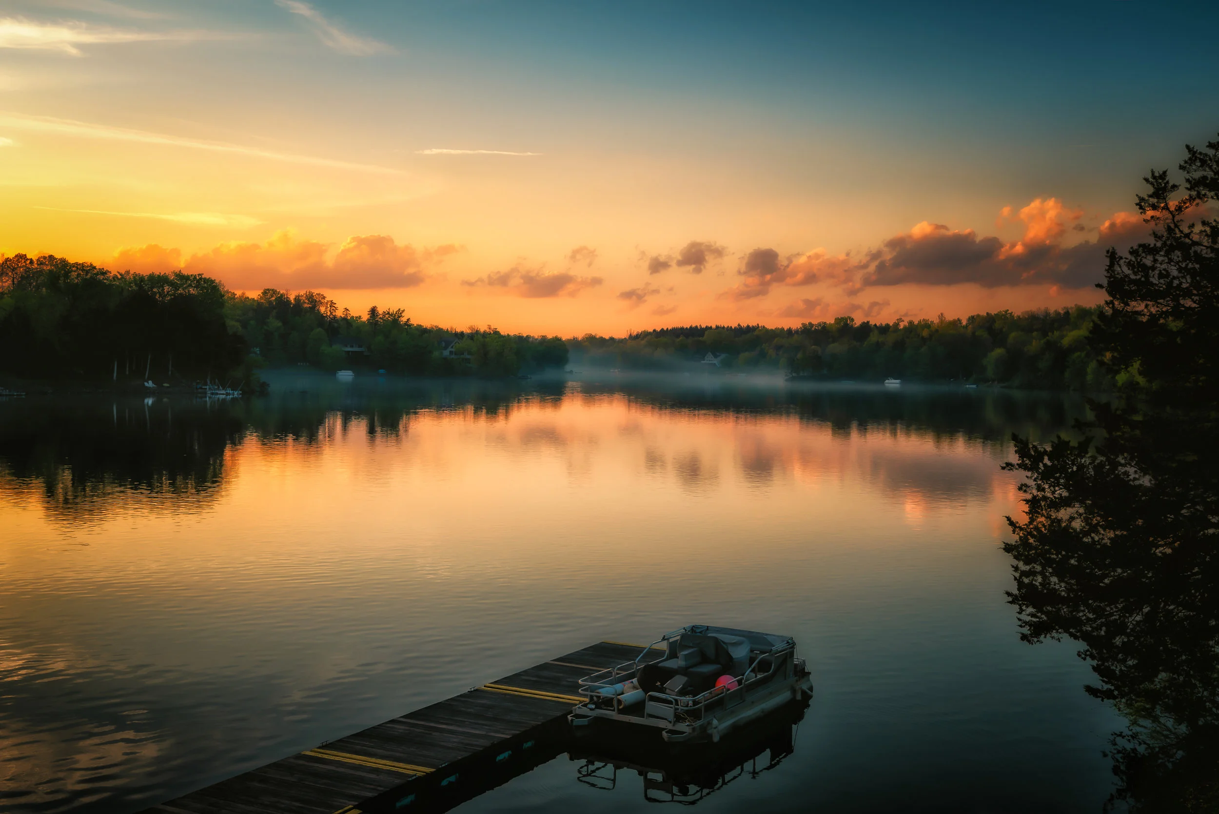 Lake Sunset - Nikon D750, 1/80 @ f/10, ISO 100, 40mm. Captured on the eve of my daughter’s wedding.