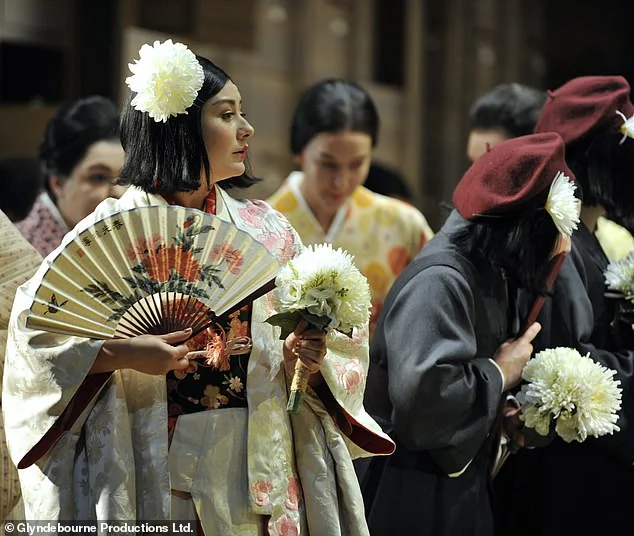 3074730-5767465-Act_1_of_Annilese_Miskimmon_s_Madama_Butterfly_really_is_a_mess_-a-27_1527177185624.jpg
