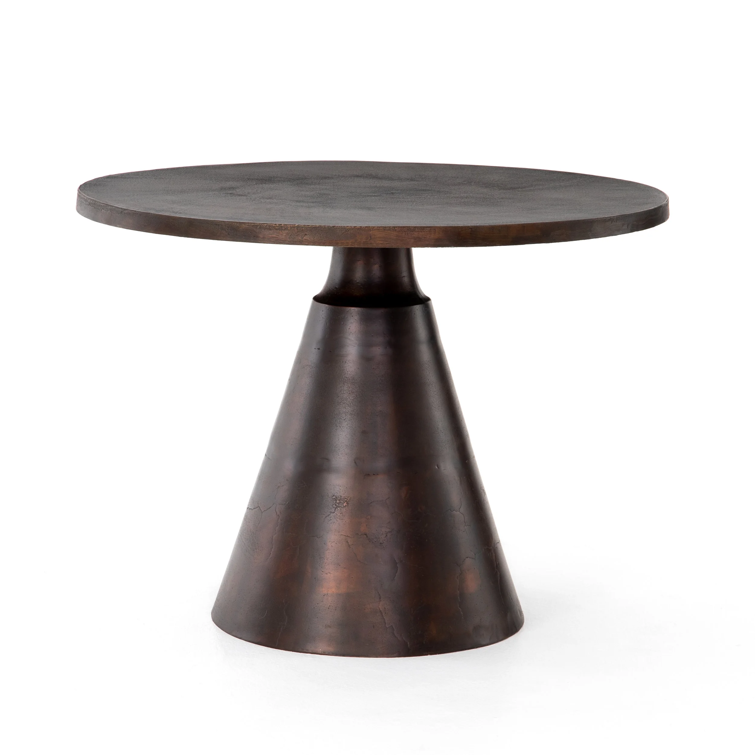 Mina Bistro Table | This solid aluminum table is finished in antique ruse for a visually arresting look, indoors of out. We recommend covering this industrial beauty during inclement weather.
