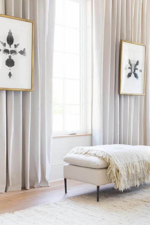Layering white furniture pieces and accessories adds dimension and texture in a more subtle fashion. (Photography by Alyssa Rosenheck )