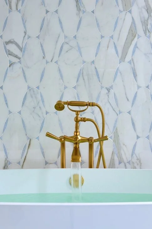 If you look closely, details like this old school tub faucet can be spotted throughout the home.