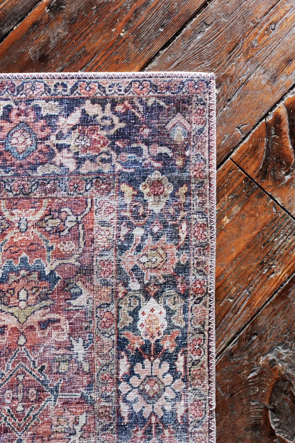 The Layla Spice Marine runner pairs perfectly with the wood floors