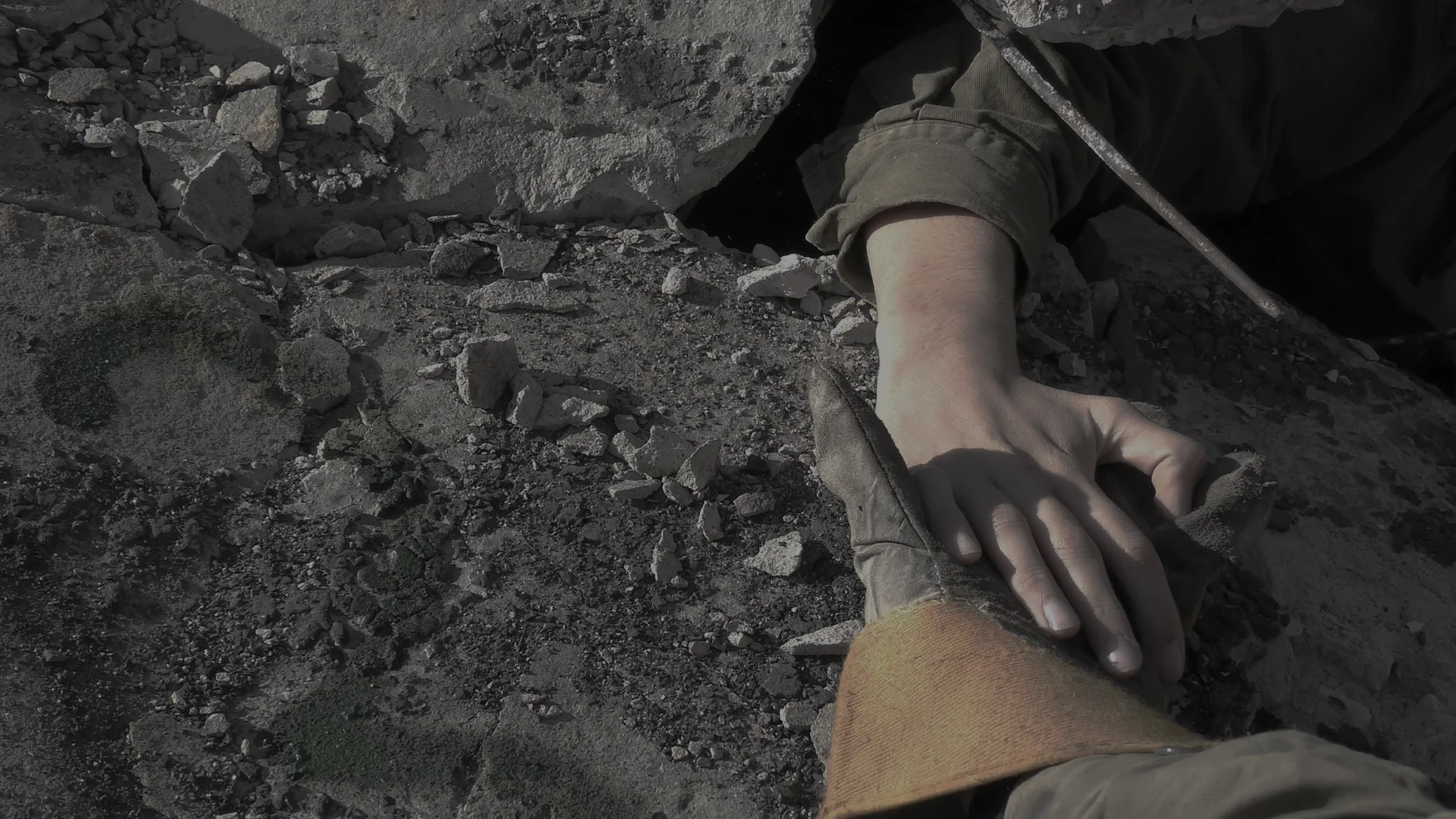 HandInRubble.jpg