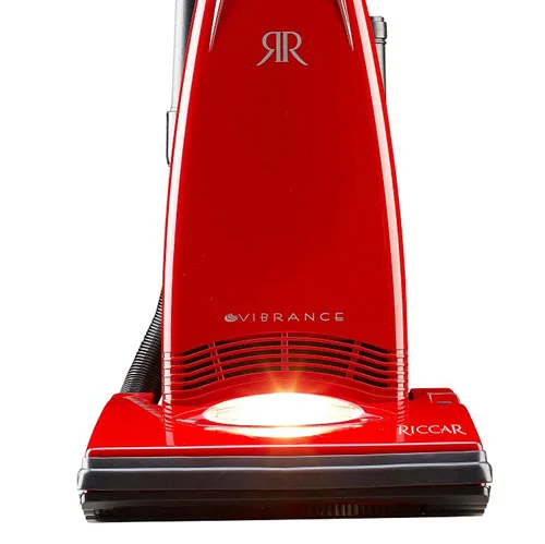 Riccar Vibrance Classic Standard (R20SC) - $429.95 • Carpet and Rug Institute – Gold Seal of Approval • Assembled in the United States of America • Onboard FastTask Tools • 10 Amp Motor • 616 Air Watts at Hose • Foam Filters, Available HEPA Bag • ABS Handle, Bottom Plate, & Wheels • Metal Brushroll & Rubber Belt • 30’ Cord • Xenon Headlight, Switch on Body • 22.5 lbs. • 3 Year Warranty