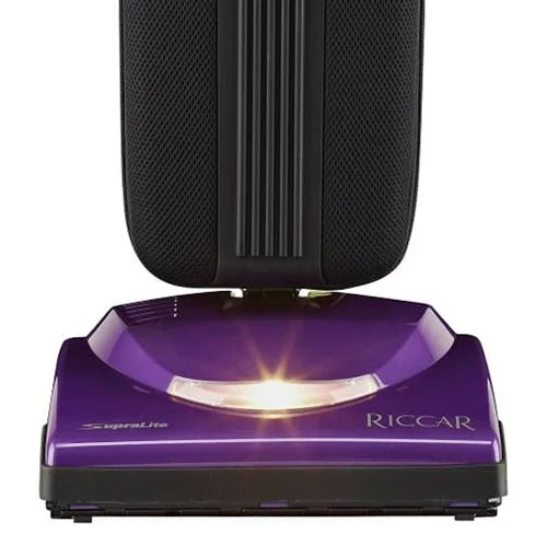 Riccar Supralite Standard (R10S) - $499.95 • Carpet and Rug Institute – Gold Seal of Approval • Assembled in the United States of America • 5.5 Amps, 2-Speeds • Switch on Handle • HEPA Bag, 24” Long • Metal Handle With Ergonomic Grip, Metal Brushroll • Rubber Belt, Bare Floor Squeegee, Rubber Wheels • 35’ Cord • Xenon Headlight • 9 lbs. • 4 Year Warranty