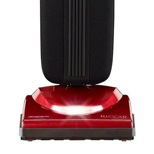 Riccar Supralite Premium (R10P) - $699.95 • Carpet and Rug Institute – Gold Seal of Approval • Assembled in the United States of America • 5.5 Amps, 2-Speeds • Switch on Handle • HEPA Bag, 24” Long • Metal Handle With Ergonomic Grip, Metal Brushroll • Bare Floor Squeegee, Rubber Wheels • Lifetime Serpentine Belt • 40’ Cord, Xenon Headlight • 9 lbs. • 5 Year Warranty, 2 Years Free Servicing