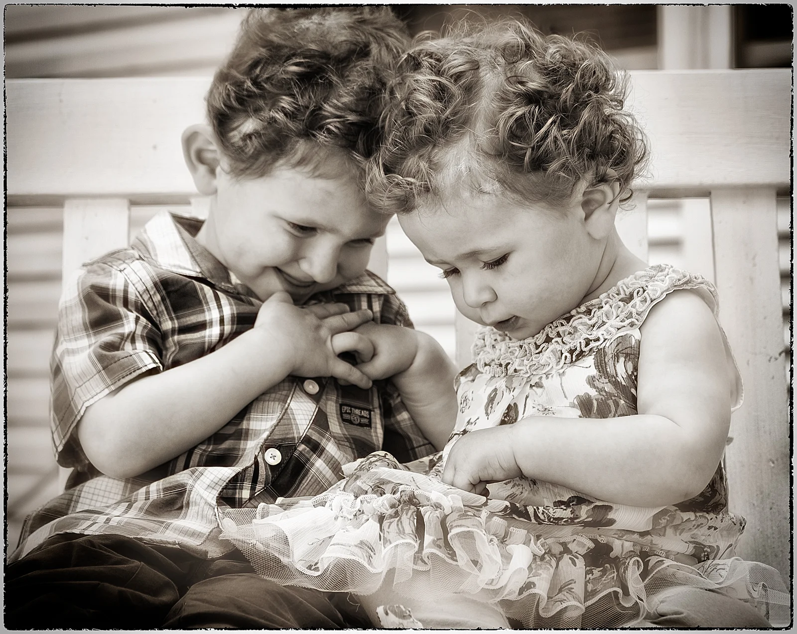 smiling siblings b&w.jpg