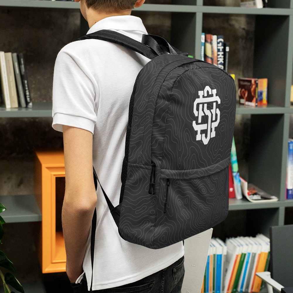 backpack_frontBLACK-SMALLER_backpack_top_panelsBLACK_backpack_bottom_panelB_mockup_Left_Lifestyle_White.png