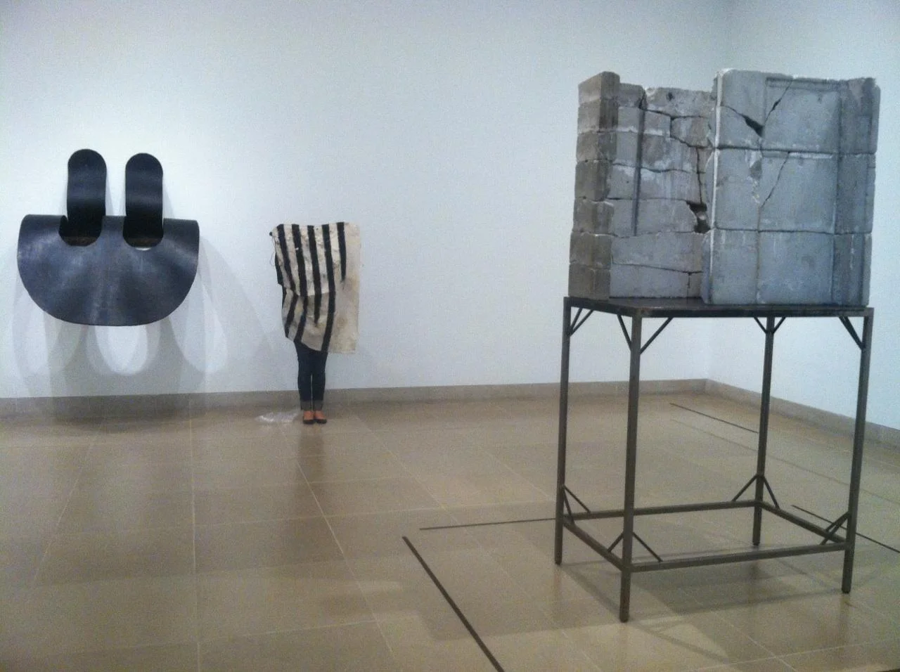 Place Mat series, Flag, 2018 held up casually at the Dallas Museum of Art ‘Body Ego’ installation. Heide Fasnacht, Witness, 1990 and Isa Genzken, Door (Tur) 1988. Courtesy of Zosima Gallery Daniel and Billi