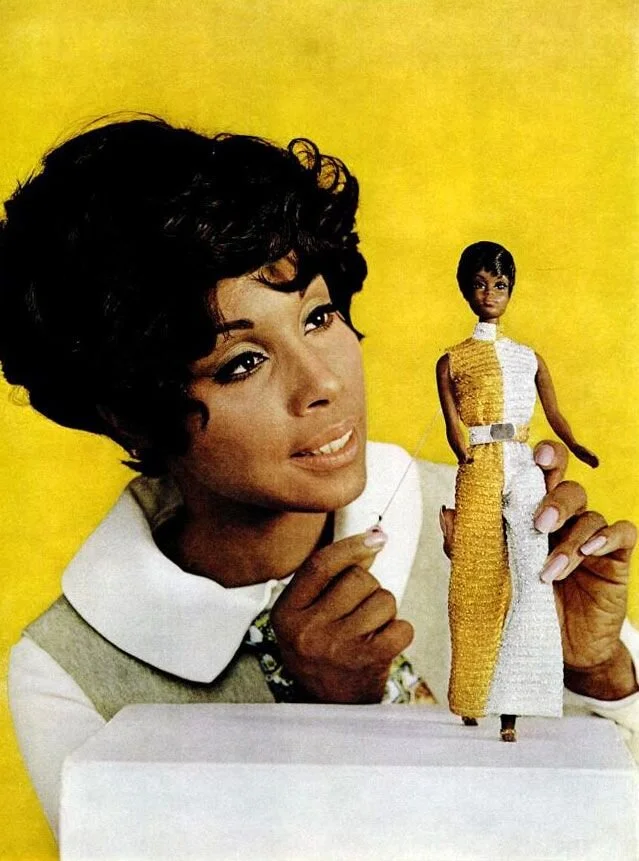 Diahann with the pull-string Julia barbie